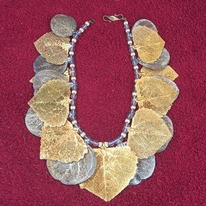 Gold and silver necklace.